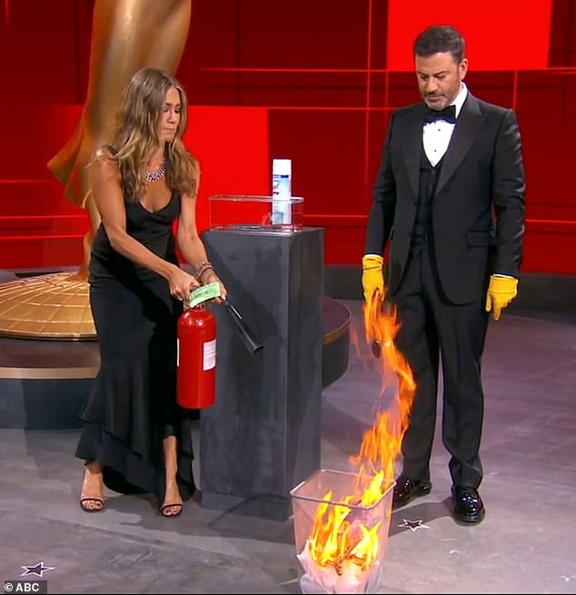 Putting out fires: The Morning Show nominee joined host Jimmy Kimmel on stage in the empty Staples Center auditorium