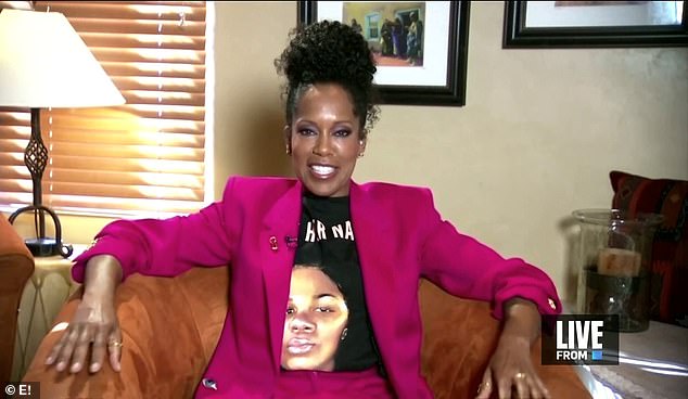 Sitting pretty: Regina King honored murdered Breonna Taylor with her choice of shirt under a striking fuchsia suit
