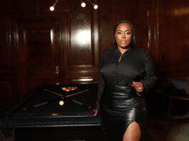 Why Finding A Target Consumer That’s Overlooked & Unsaturated Is Great For Business Ebony Swank standing