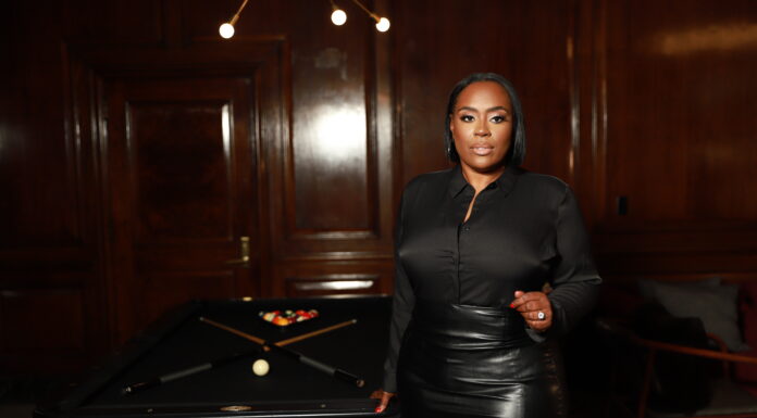 Why Finding A Target Consumer That’s Overlooked & Unsaturated Is Great For Business Ebony Swank standing