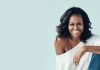 3 Attributes of A Great Female Leader and How to Harness Them in 2022 Michelle Obama smiling and sitting