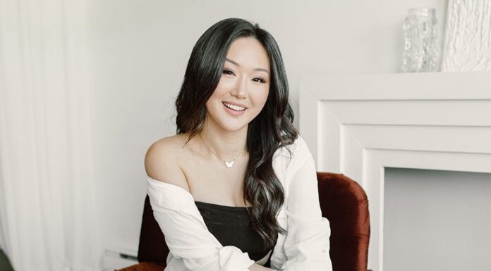 Content Creator and CEO Vanessa Lau’s Number One Tip for Getting a Seat at the Table Vanessa Lau sitting and smiling