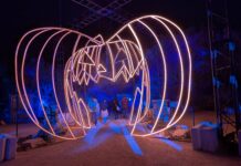 The Light and Shadow Walk: What The Nightmare Before Christmas Trail Means 30 Years Later The Gigantic Walk-Through Pumpkin Entrance to the Austin Light Trail