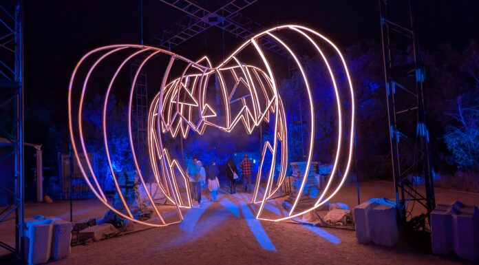 The Light and Shadow Walk: What The Nightmare Before Christmas Trail Means 30 Years Later The Gigantic Walk-Through Pumpkin Entrance to the Austin Light Trail
