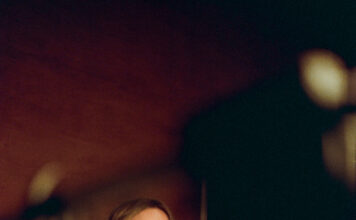 Hilary Duff Signs with Atlantic Records for Global Return Hilary Duff posing for her 2025 Atlantic Records signing announcement.