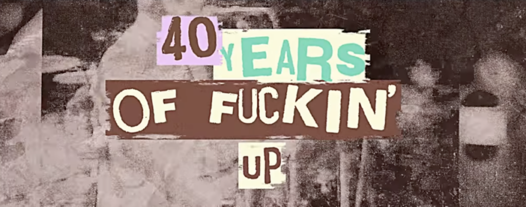 A greyscale with light coloring of the official NOFX 40 Years of Fuckin' Up banner