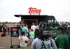Why Topps Rip Night is a Must-Attend for Every Collector SACRAMENTO, CALIFORNIA - SEPTEMBER 28: Fans visit the Topps truck before a baseball game between the Athletics and the Kansas City Royals Sacramento, California. (Photo by Scott Marshall/Getty Images)