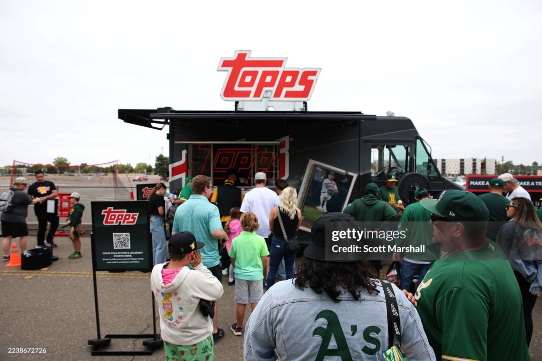 sacramento-california-september-28-fans-visit-the-topps-truck-before-a-baseball-game-between-the-athletics-and-the-kansas-city-royals-sacramento-california-photo-by-scott-marshallgetty-images-stockpack-gettyimages SACRAMENTO, CALIFORNIA - SEPTEMBER 28: Fans visit the Topps truck before a baseball game between the Athletics and the Kansas City Royals Sacramento, California. (Photo by Scott Marshall/Getty Images)