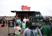 Why Topps Rip Night is a Must-Attend for Every Collector SACRAMENTO, CALIFORNIA - SEPTEMBER 28: Fans visit the Topps truck before a baseball game between the Athletics and the Kansas City Royals Sacramento, California. (Photo by Scott Marshall/Getty Images)