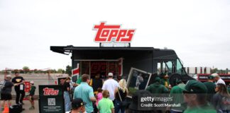 Why Topps Rip Night is a Must-Attend for Every Collector SACRAMENTO, CALIFORNIA - SEPTEMBER 28: Fans visit the Topps truck before a baseball game between the Athletics and the Kansas City Royals Sacramento, California. (Photo by Scott Marshall/Getty Images)