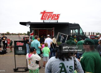Why Topps Rip Night is a Must-Attend for Every Collector SACRAMENTO, CALIFORNIA - SEPTEMBER 28: Fans visit the Topps truck before a baseball game between the Athletics and the Kansas City Royals Sacramento, California. (Photo by Scott Marshall/Getty Images)