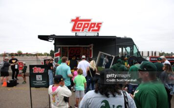 Why Topps Rip Night is a Must-Attend for Every Collector SACRAMENTO, CALIFORNIA - SEPTEMBER 28: Fans visit the Topps truck before a baseball game between the Athletics and the Kansas City Royals Sacramento, California. (Photo by Scott Marshall/Getty Images)