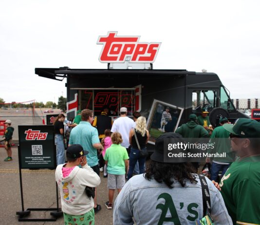 Why Topps Rip Night is a Must-Attend for Every Collector SACRAMENTO, CALIFORNIA - SEPTEMBER 28: Fans visit the Topps truck before a baseball game between the Athletics and the Kansas City Royals Sacramento, California. (Photo by Scott Marshall/Getty Images)