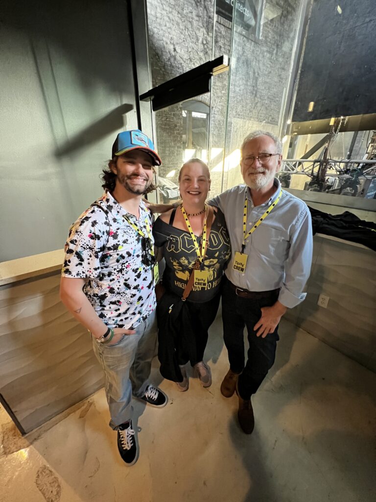 Tipify's Dan Carucci and True Hollywood Talk's Andrew Rossow standing next to eachother in the Tipify x SPIN Lounge at the Spin Magazine's 'Road to Austin' showcase during SXSW 2026 in Austin, Texas.