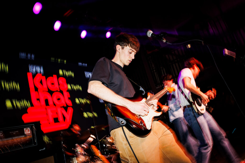 Kids That Fly perform at SPIN x Tipify showcase during SXSW 2026 in Austin, Texas.
