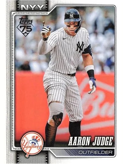 Aaron Judge points to his teammates after reaching first base in a game at Yankee Stadium in 2026.